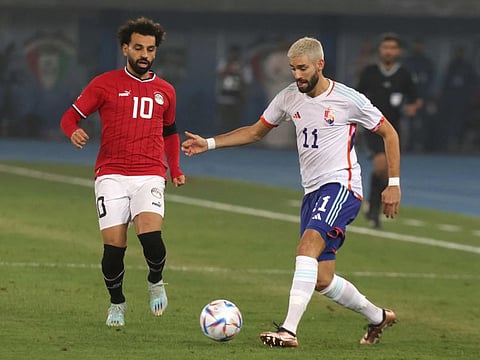 Egypt's forward Mohamed Salah (left) and Belgium's midfielder Yannick Carrasco vie for the ball during the friendly at the Jaber Al-Ahmad Stadium in Kuwait City.