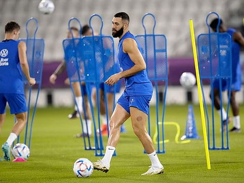 France's Karim Benzema practices during a training session at the Jassim Bin Hamad stadium in Doha, Qatar. The Real Madrid striker has been ruled out of the tournament due to injury. It is a massive blow to France who have already lost star players N'Golo Kante and Paul Pogba to injury.