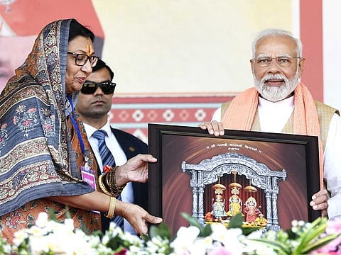 Prime Minister Narendra Modi being felicitated during a public meeting for the upcoming Gujarat Assembly elections, in Botad on Sunday, November 20, 2022.