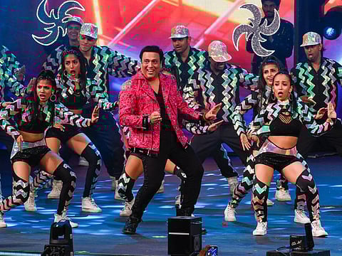 Govinda performing at Filmfare Middle East Achievers Night 2022.
