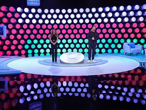 Mahzooz hosts during the draw