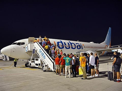 Passengers boarding a flydubai shuttle flight.