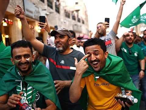 Saudi Arabia fans celebrate in Souq Waqif after the match between Saudia Arabia and Argentina.