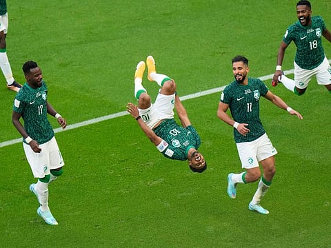 Saudi Arabia's Salem Al Dawsari (second from left) celebrates after scoring his side's eventual match-winner in Group match against Argentina at Lusail Stadium in Lusail on Tuesday.