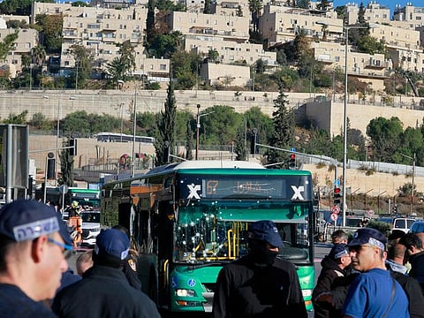 Israeli security forces gather in Jerusalem following an explosion at a bus stop on November 23, 2022.