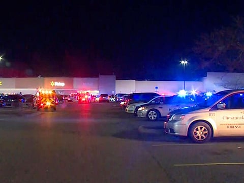 In this image from video police respond to the scene of a fatal shooting at a Walmart on Tuesday night, Nov. 22, 2022, in Chesapeake, Va.