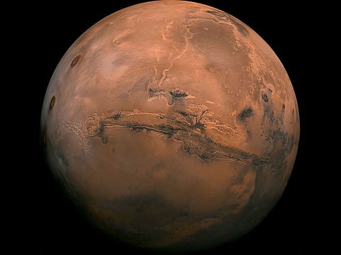 A view of the Valles Marineris hemisphere of Mars, at a distance of about 2,500km from the planet.