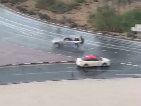 Still from a video showing a four-wheeler doing stunts in the rain on Tuesday in Dubai