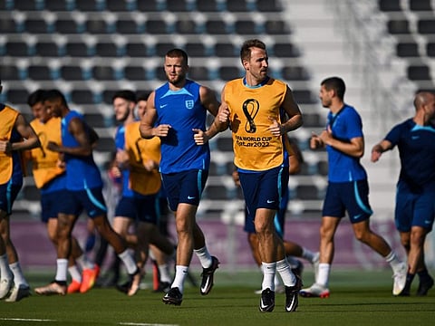 England's forward Harry Kane attends a training session with his teammates at Al Wakrah SC Stadium in Al Wakrah, south of Doha on the eve of the Qatar 2022 World Cup match against USA