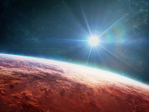 New observations of WASP-39b with the James Webb Space Telescope have provided a clearer picture of the exoplanet, showing the presence of sodium, potassium, water, carbon dioxide, carbon monoxide and sulfur dioxide in the planet's atmosphere. This artist's illustration also displays newly detected patches of clouds scattered across the planet.