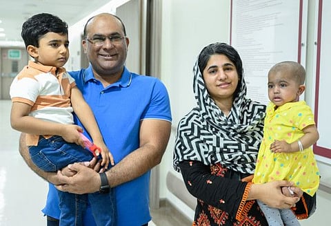 Eman, 2, with her parents and brother after her successful bone marrow transplant at Burjeel Medical City.