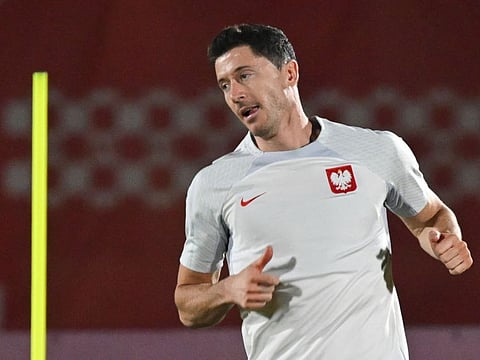Poland's forward Robert Lewandowski takes part in a training session with teammates at Al Kharaitiyat SC in Doha.