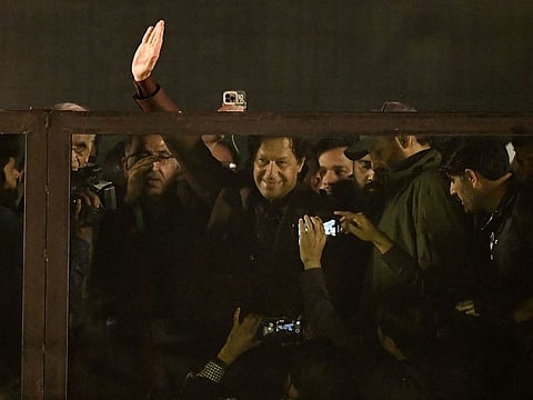 Imran khan waves to the crowd at Saturday’s rally.