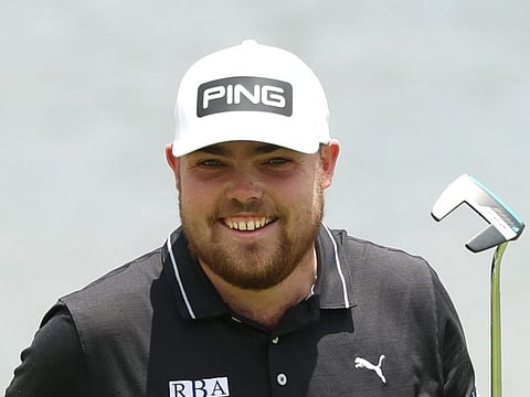 Current leader Dan Bradbury in the rain affected Joburg Open on the DP World Tour