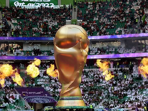 A replica trophy displayed in the stadium before the match in Doha