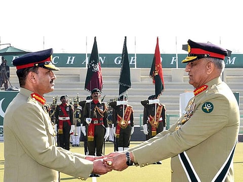 General Qamar Javed Bajwa (right) handing over command of Pakistan Army to General Asim Munir at a change-of-command ceremony in Rawalpindi.