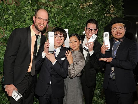 Daniel Scheinert, Ke Huy Quan, Stephanie Hsu, Jonathan Wang and Daniel Kwan pose with their awards for Best Feature for "Everything Everywhere All At Once" at the 2022 Gotham Awards in Manhattan.