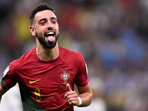Portugal’s midfielder Bruno Fernandes celebrates after scoring his team’s second goal against Uruguay in the Qatar 2022 World Cup Group H football match at the Lusail Stadium in Qatar on November 28, 2022. Fernandes has been the Portugal’s mainstay in the tournament so far.