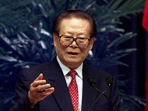China's President Jiang Zemin gestures while speaking at the George Bush Presidential Library in College Station, Texas, US.