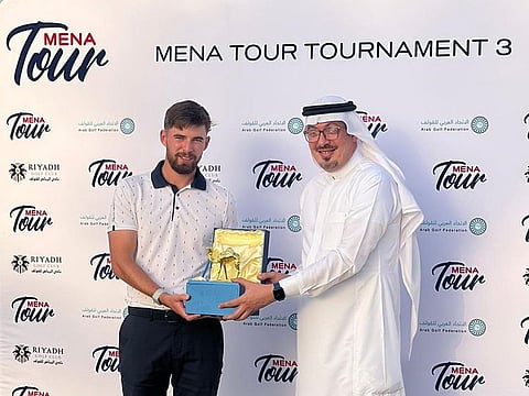 Bailey Gill recieving his trophy after winning MENA Tour Tournament 3