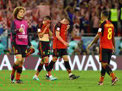 Belgium's Timothy Castagne and Toby Alderweireld look dejected after the match as Belgium are eliminated from the World Cup.