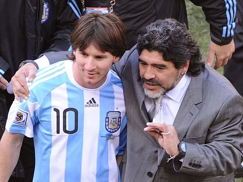 Diego Maradona (right) and Lionel Messi.