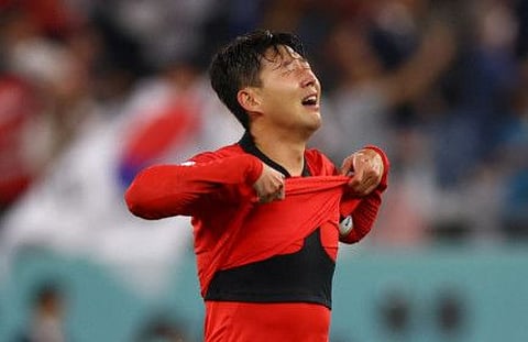 South Korea's Son Heung-min celebrates after the match against Portugal after his team qualified for the knockout stages of the FIFA World Cup Qatar 2022.