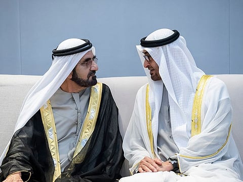 President His Highness Sheikh Mohamed bin Zayed Al Nahyan, right, with His Highness Sheikh Mohammed bin Rashid Al Maktoum, Vice-President, Prime Minister of the UAE, Ruler of Dubai and Minister of Defence, while attending the National Day official celebration held at the Abu Dhabi National Exhibition Centre (ADNEC) on Friday.