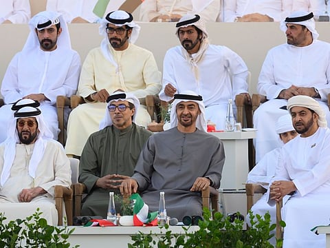 Front row: President His Highness Sheikh Mohamed bin Zayed Al Nahyan (3rd from left) along with Sheikh Tahnoon bin Mohamed Al Nahyan, Ruler's Representative in Al Ain Region (left), Sheikh Mansour bin Zayed Al Nahyan, UAE Deputy Prime Minister and Minister of the Presidential Court (2nd left), Sheikh Hamdan bin Zayed Al Nahyan, Ruler’s Representative in Al Dhafra Region (right), watch 'March of the Union', during the Sheikh Zayed Heritage Festival.