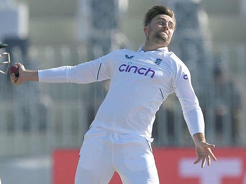 England's Will Jacks delivers the ball during the fourth day of the first Test against Pakistan at the Rawalpindi Cricket Stadium, in Rawalpindi on December 4, 2022.