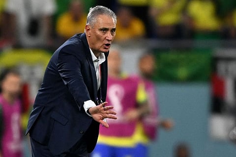 Brazil's coach Tite gestures on the touchline during the Qatar 2022 World Cup round of 16 football match between Brazil and South Korea at Stadium 974 in Doha.