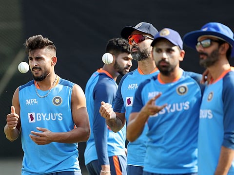 India's batting coach Vikram Rathour, bowling coach Paras Mhambrey and players Umran Malik and Deepak Chahar during a practice session on the eve of the second ODI match against Bangladesh in Dhaka on Tuesday.