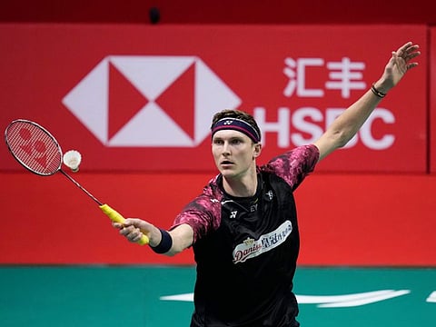 Denmark's Viktor Axelsen competes against China's Lu Guangzu during their men's singles Group A match at the BWF World Tour Finals in Bangkok on Wednesday.