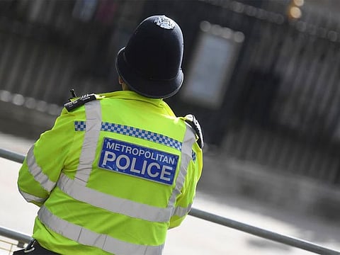 A Metropolitan Police officer stands on duty in Westminster, London, Britain, October 1, 2021