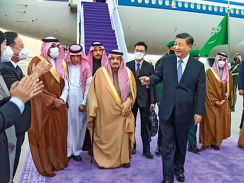 Xi Jinping is received by officials including the Governor of Riyadh province Prince Faisal Bin Bandar Al Saud at King Khalid International Airport in Riyadh.
