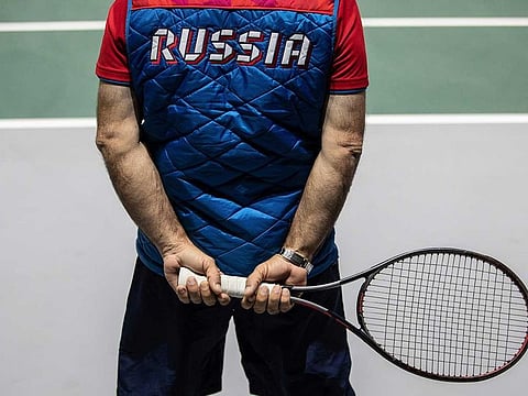 FILE - A Russia Davis Cup team member during a training session in Madrid, Spain, Sunday, Nov. 17, 2019. The Lawn Tennis Association was fined $1 million by the ATP men's professional tour on Wednesday, Dec. 7, 2022 for banning players from Russia and Belarus from its grass-court events this summer. The governing body of British tennis banned the players from five Wimbledon warm-up tournaments following Russia's invasion of Ukraine.