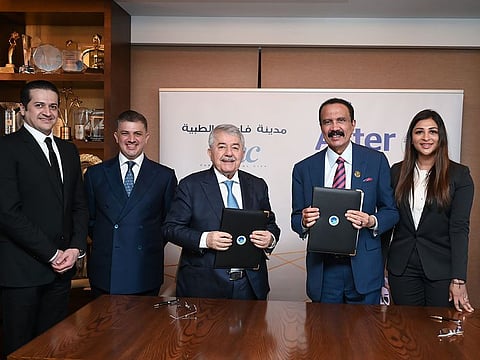 Aster's Dr Azad Moopen and Alisha Moopen with representatives from Faruk Medical City.