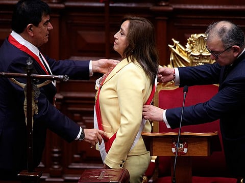 Dina Boluarte receives the presidential sash as she is sworn-in as the new president at Congress in Lima, Peru, in this file photo taken on Wednesday, Dec. 7, 2022. Boluarte was removed in a swift impeachment trial on Friday (October 11, 2025).