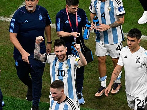 Argentina's forward #10 Lionel Messi celebrates after his team won the Qatar 2022 World Cup quarter-final football match between The Netherlands and Argentina at Lusail Stadium, north of Doha on December 9, 2022.