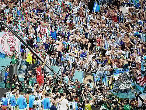 Argentina players celebrate with their fans at the end of the World Cup quarter-final match against Netherlands, at the Lusail Stadium in Lusail, Qatar, on December 10, 2022.