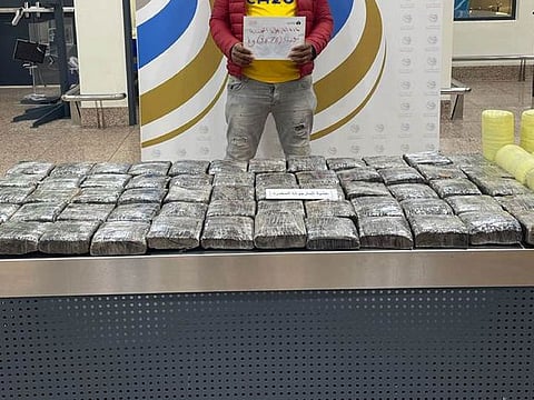 Dubai Customs seize 36.76kg of marijuana at Dubai International Airport, hidden in two bags of an African passenger.