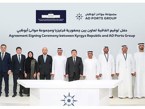 Akylbek Zhaparov, Chairman of the Cabinet of Ministers in Kyrgyzstan, and Captain Mohamed Juma Al Shamisi, Managing Director and Group CEO, AD Ports Group, with officials during the signing of the agreements.