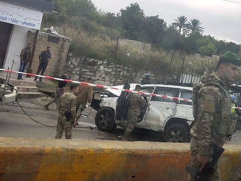 Lebanese forces secure the area where a UN peacekeeping force UNIFIL convoy came under small arms fire, in the village of Aqibya in south Lebanon, on December 15, 2022.