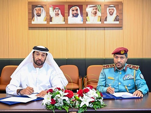 Brigadier General Dr Ahmed Saeed Al Naour (right), director-general of the General Department of Central Operations at Sharjah Police, and Abdul Jalil Mohammad Al Marzouqi on behalf of the Information Centre, signed the agreement