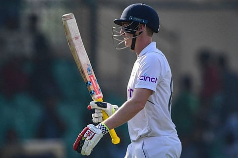 England's Harry Brook walks back to the pavilion after his dismissal by Pakistan's Mohammad Wasim (not pictured) during the second day of the third Test at the National Stadium in Karachi.