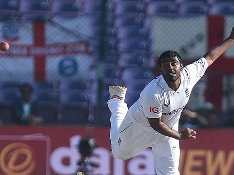 England's Rehan Ahmed delivers a ball during the third day of the third Test against Pakistan at the National Stadium in Karachi on Monday.