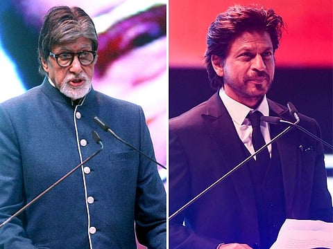 Bollywood actors Amitabh Bachchan and Shah Rukh Khan address during the inauguration of 28th Kolkata International film festival in Kolkata
