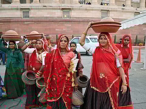 Traditional food makers from Karnataka and Rajasthan leave after preparing various millet delicacies for Parliamentarians at Parliament House, in New Delhi on Tuesday, Dec 20, 2022.