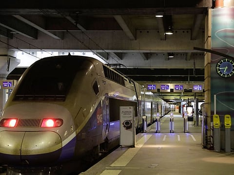 In this file photo taken on April 8, 2018 a high speed TGV train stands at a platform at the Gare Montparnasse train station in Paris as French rail workers launched their latest two-day strike today over plans to overhaul the heavily indebted train operator SNCF, the biggest test yet to French President's drive to reform the country's economy.