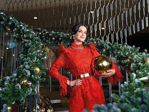 Red lace dress by Zimmermann Dh6,388 The PosH OUTNET Pop-Up* Earrings, necklace, bangles and ring, POR, Kalyan Jewellers